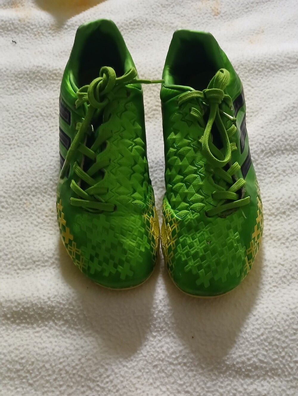 Kids Green Soccer Cleats with Black Accents